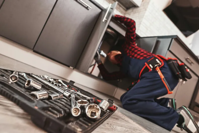 Tradie on the tools taking a call — ReplyMate use case